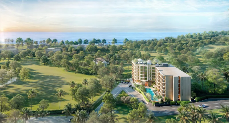 Saint Tropez Naithon — the site amid Nai Thon greenery with the sea beyond