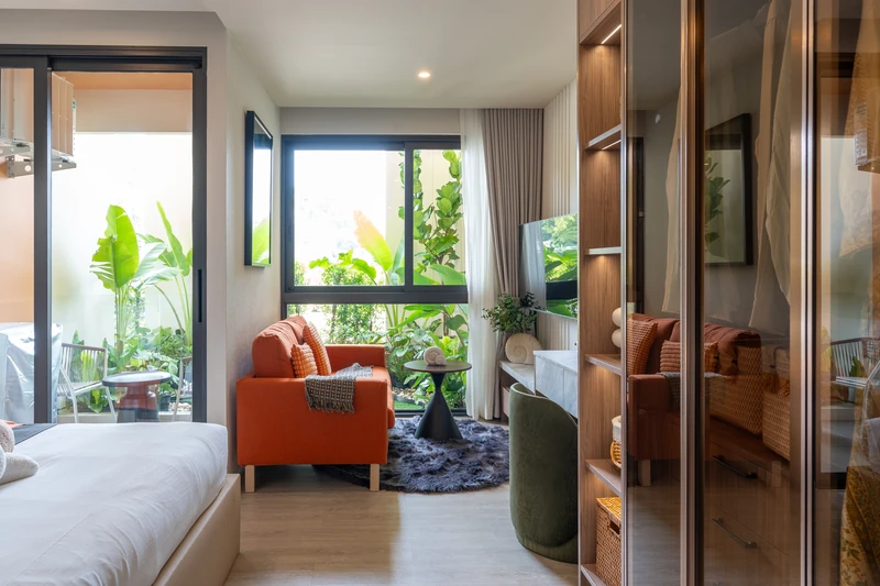 Saint Tropez Naithon — studio A show unit: living area and the terrace door